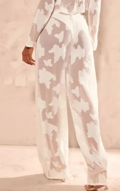 PrettyLittleThing Sheer Woven Floral Devore Wide Leg Pants Cream
