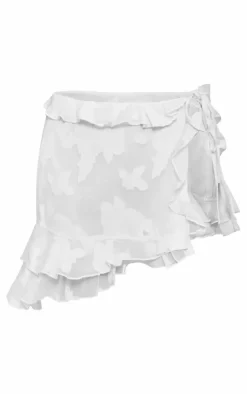 Outlet PrettyLittleThing Textured Chiffon Tie Side Frilly Mini Skirt Cream