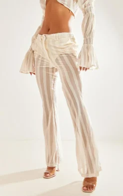 PrettyLittleThing Textured Woven Flare Pants Cream