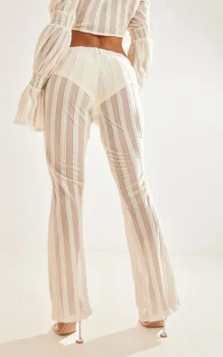 PrettyLittleThing Textured Woven Flare Pants Cream
