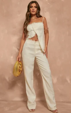 Sale PrettyLittleThing Textured Woven Raw Hem Low Rise Straight Leg Pants Cream