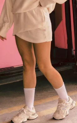 Best PrettyLittleThing Wrap Over Sweat Mini Skirt Cream