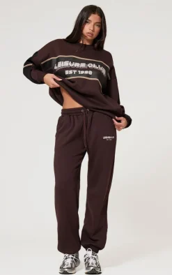 Hot PrettyLittleThing Print Embroidered Leisure Club Wide Leg Sweatpants Dark Brown