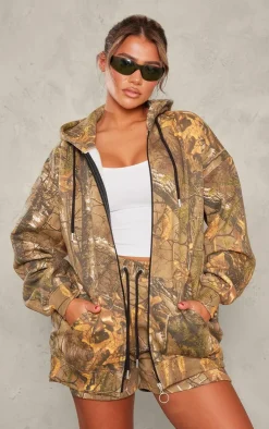 Online PrettyLittleThing Green Forest Camo Black Badge Zip Up Oversized Hoodie Forest Green