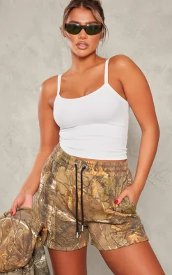 Clearance PrettyLittleThing Forest Camo Black Oversized Badge Runner Shorts Green