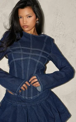 Online PrettyLittleThing Corset Seam Detail Long Sleeve Denim Crop Top Indigo