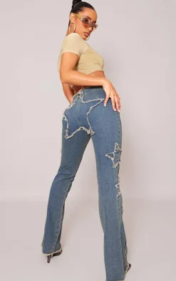 Indigo Vintage Wash Raw Hem Star Embroidery Flared Jeans