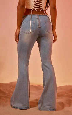 Light Blue Vintage Wash Front Frayed Seam Lace Up Detail Flared Jeans