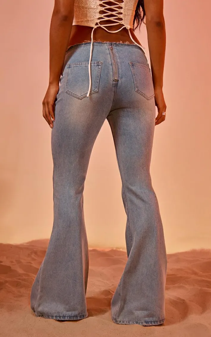 Light Blue Vintage Wash Front Frayed Seam Lace Up Detail Flared Jeans