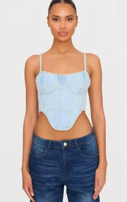 PrettyLittleThing Dipped Hem Denim Corset Light Blue Wash