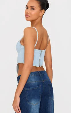 PrettyLittleThing Dipped Hem Denim Corset Light Blue Wash