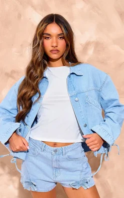Online PrettyLittleThing Lace Up Bow Detail Cropped Denim Jacket Light Blue Wash