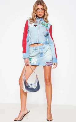 Sale PrettyLittleThing Racer Graphic Denim Mini Skirt Light Blue Wash
