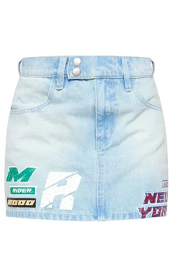 Sale PrettyLittleThing Racer Graphic Denim Mini Skirt Light Blue Wash