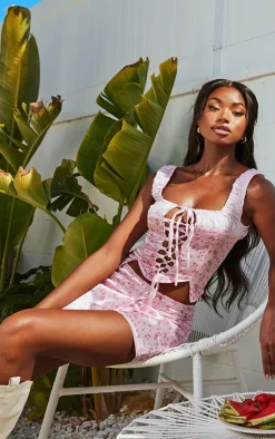 Clearance PrettyLittleThing Ditsy Floral Print Satin Lace Up Ruched Bust Corset Light Pink