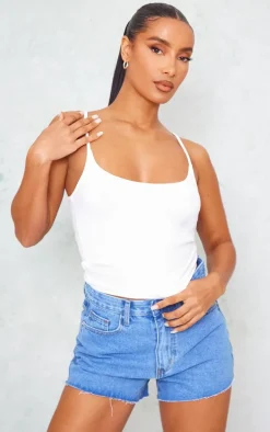 Mid Blue Wash Denim Raw Hem Hot Pants