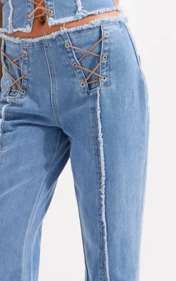 Mid Blue Wash Frayed Detail Lace Up Flared Denim Jeans