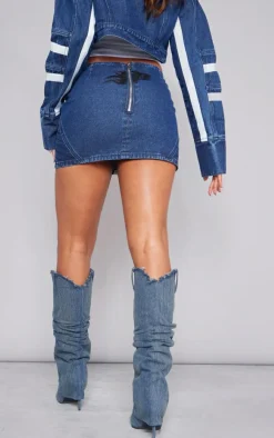 Hot PrettyLittleThing Graphic Panelled Denim Mini Skirt Mid Blue Wash