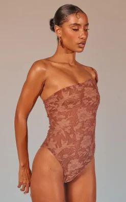 Discount PrettyLittleThing Floral Sheer Burnout Asymmetric Twist Detail Strap Bodysuit Mocha
