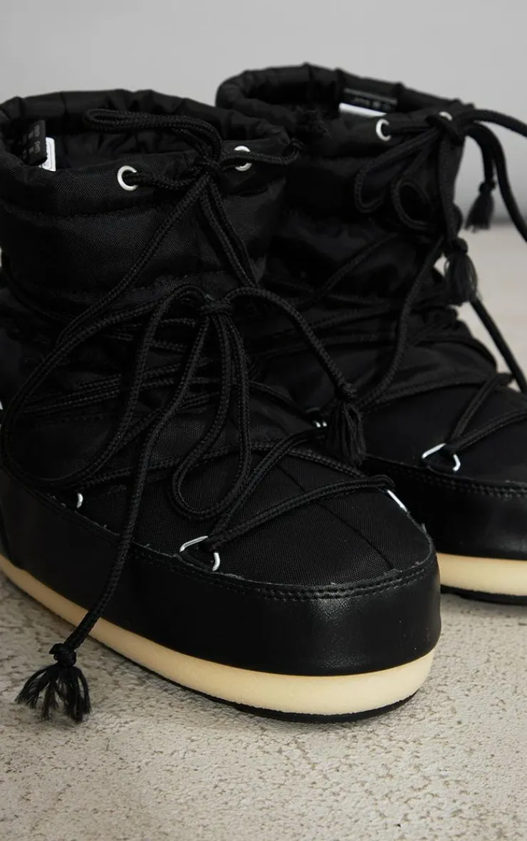 PrettyLittleThing Black Boots*MOON BOOT Light Low