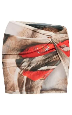 Hot PrettyLittleThing Face Print Mesh Knot Detail Micro Mini Skirt Nude
