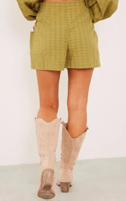 Online PrettyLittleThing Textured Woven Lace Up Side Tailored Shorts Olive