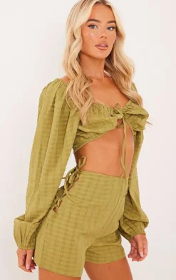Online PrettyLittleThing Textured Woven Lace Up Side Tailored Shorts Olive