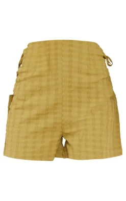 Online PrettyLittleThing Textured Woven Lace Up Side Tailored Shorts Olive