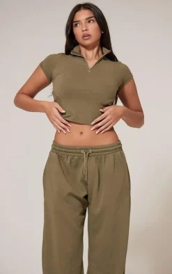 Online PrettyLittleThing Washed Zip Up Rib Panel Top Olive