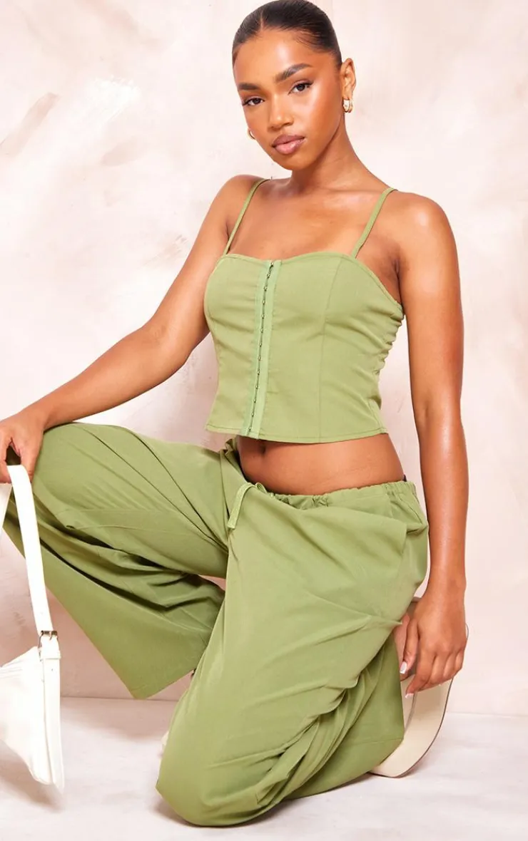Online PrettyLittleThing Woven Hook & Eye Fastening Strappy Corset Olive