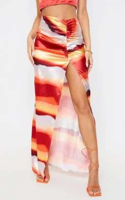 Discount PrettyLittleThing Abstract Printed Satin Ruched Side Split Leg Midaxi Skirt Orange