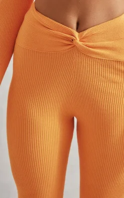 Online PrettyLittleThing Rib Knit Dipped Waist Pants Orange