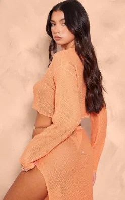 Online PrettyLittleThing Textured Sheer Knit Floaty Long Sleeve Crop Top Orange