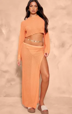Online PrettyLittleThing Textured Sheer Knit Floaty Long Sleeve Crop Top Orange