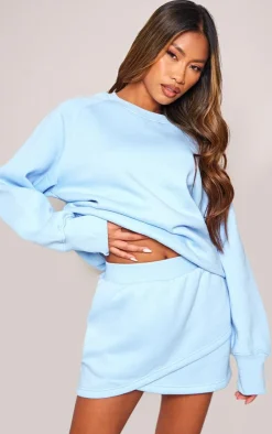 New PrettyLittleThing Wrap Over Sweat Mini Skirt Pale Blue