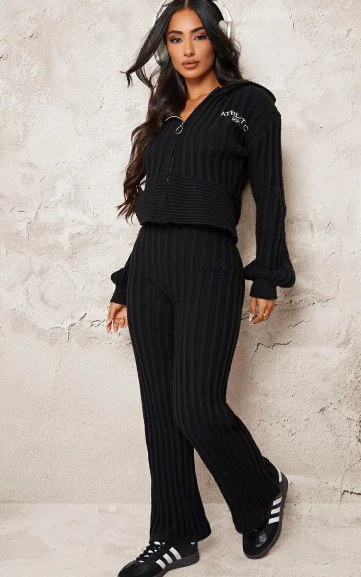 Sale PrettyLittleThing Petite Athletic Sport Embroidered Knit Flared Pants Black