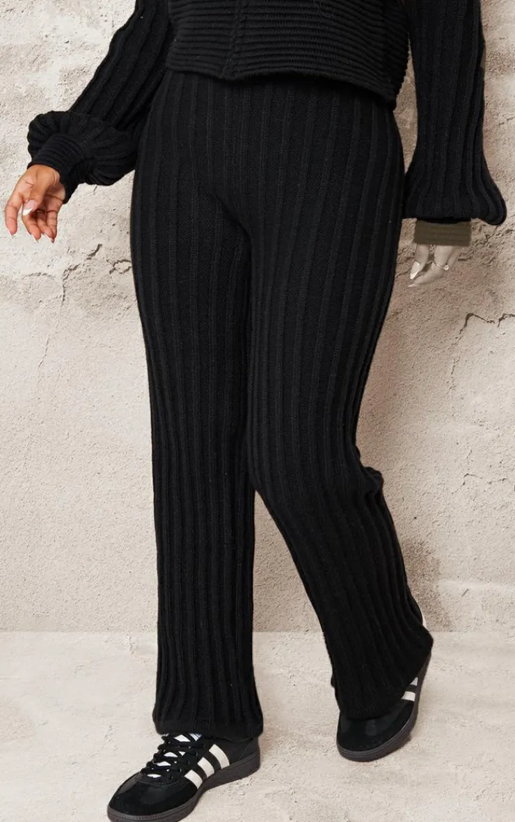 Sale PrettyLittleThing Petite Athletic Sport Embroidered Knit Flared Pants Black