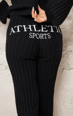Sale PrettyLittleThing Petite Athletic Sport Embroidered Knit Flared Pants Black