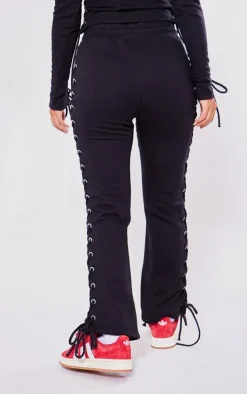 Sale PrettyLittleThing Petite Eyelet Detail Lace Up Sweatpants Black
