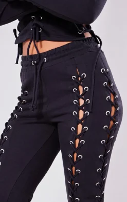 Sale PrettyLittleThing Petite Eyelet Detail Lace Up Sweatpants Black