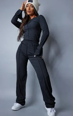Online PrettyLittleThing Petite Ribbed Seam Detail Long Sleeve Top Black