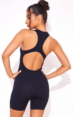 PrettyLittleThing Unitards*Petite Snatched Rib Zip Up Front Unitard