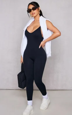 PrettyLittleThing Snatched*Petite Structured Snatched Rib Strappy Plunge Jumpsuit