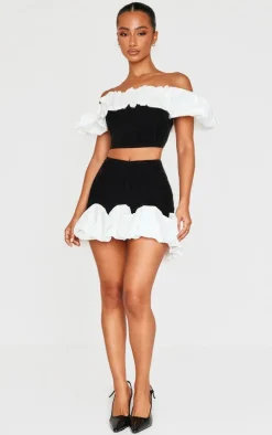Discount PrettyLittleThing Petite Velvet Ruffle Detail Asymmetric Mini Skirt Black
