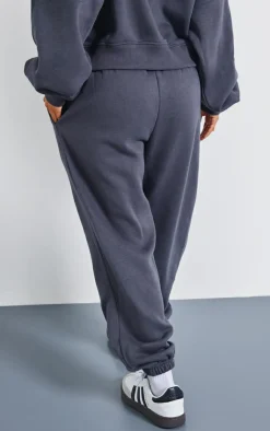 Online PrettyLittleThing Petite Graphic Cuffed Sweatpants Charcoal