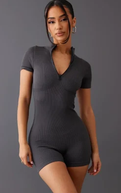 PrettyLittleThing Unitards*Petite Snatched Rib Zip Front Unitard