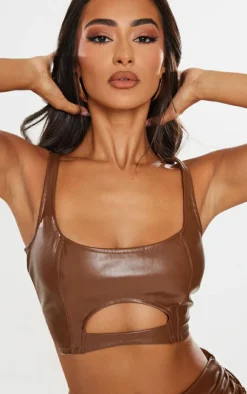 Online PrettyLittleThing Petite Cut Out Front Faux Leather Crop Top Chocolate