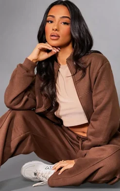 Discount PrettyLittleThing Petite Seam Detail Zip Through Track Top Chocolate