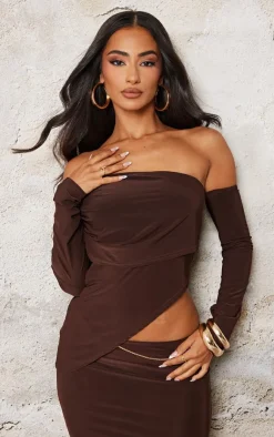 New PrettyLittleThing Petite Chocolate Slinky Asymmetric Bardot Long Top Chocolate.