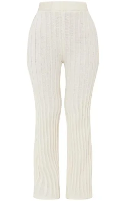 Best PrettyLittleThing Petite Athletic Sport Embroidered Knit Flared Pants Cream